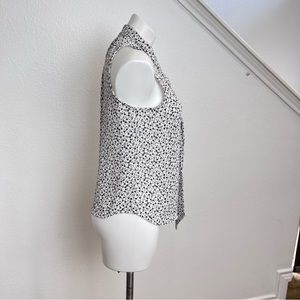 April brand sleeveless white and black floral blouse size small